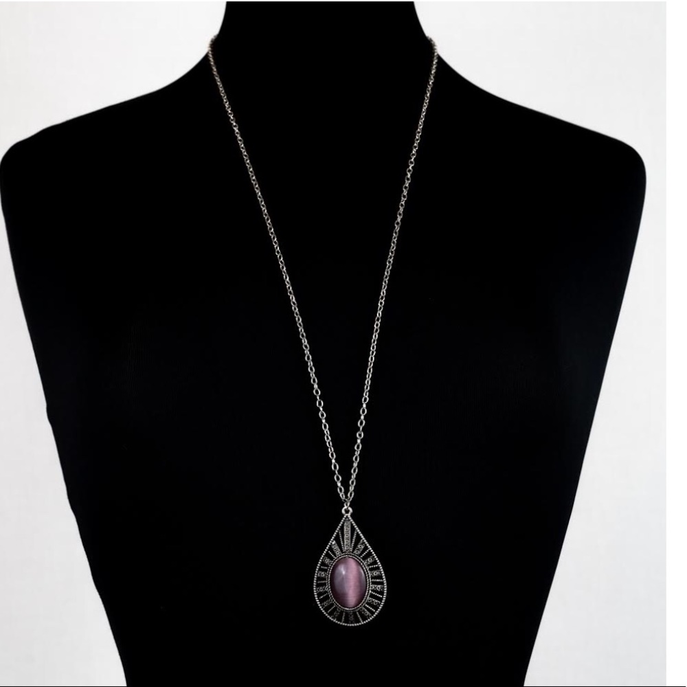 Necklace with purple pendant